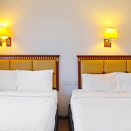 Super Oyo 90464 Borneo Suites Hotel Kota Kinabalu Buitenkant foto