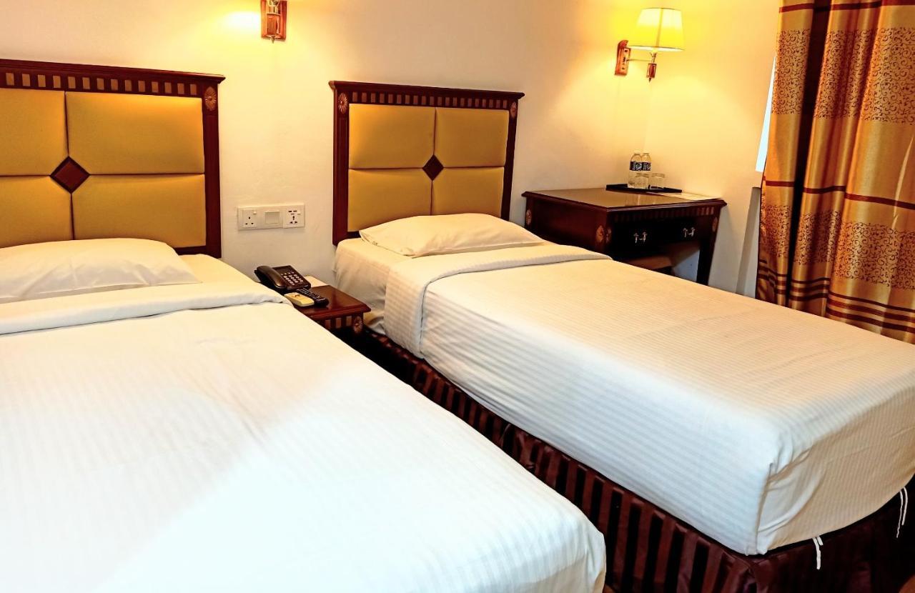 Super Oyo 90464 Borneo Suites Hotel Kota Kinabalu Buitenkant foto