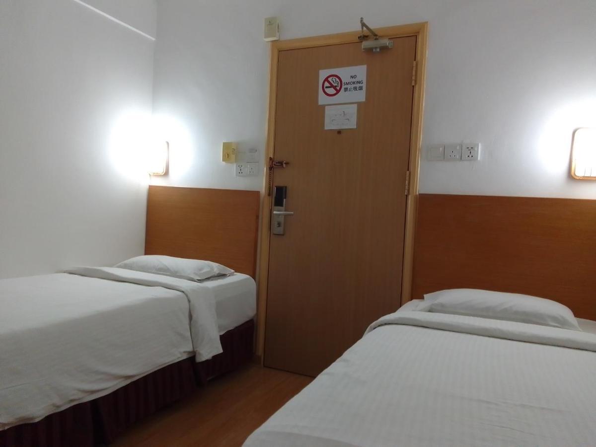 Super Oyo 90464 Borneo Suites Hotel Kota Kinabalu Buitenkant foto
