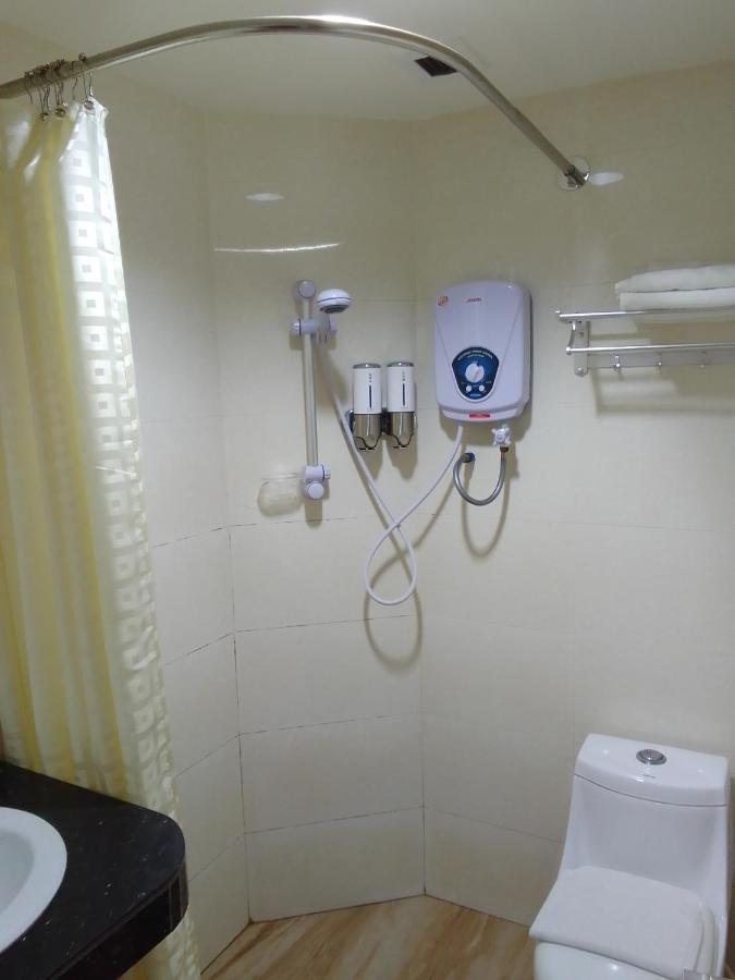 Super Oyo 90464 Borneo Suites Hotel Kota Kinabalu Buitenkant foto
