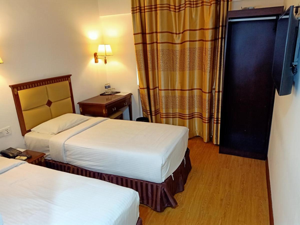 Super Oyo 90464 Borneo Suites Hotel Kota Kinabalu Buitenkant foto