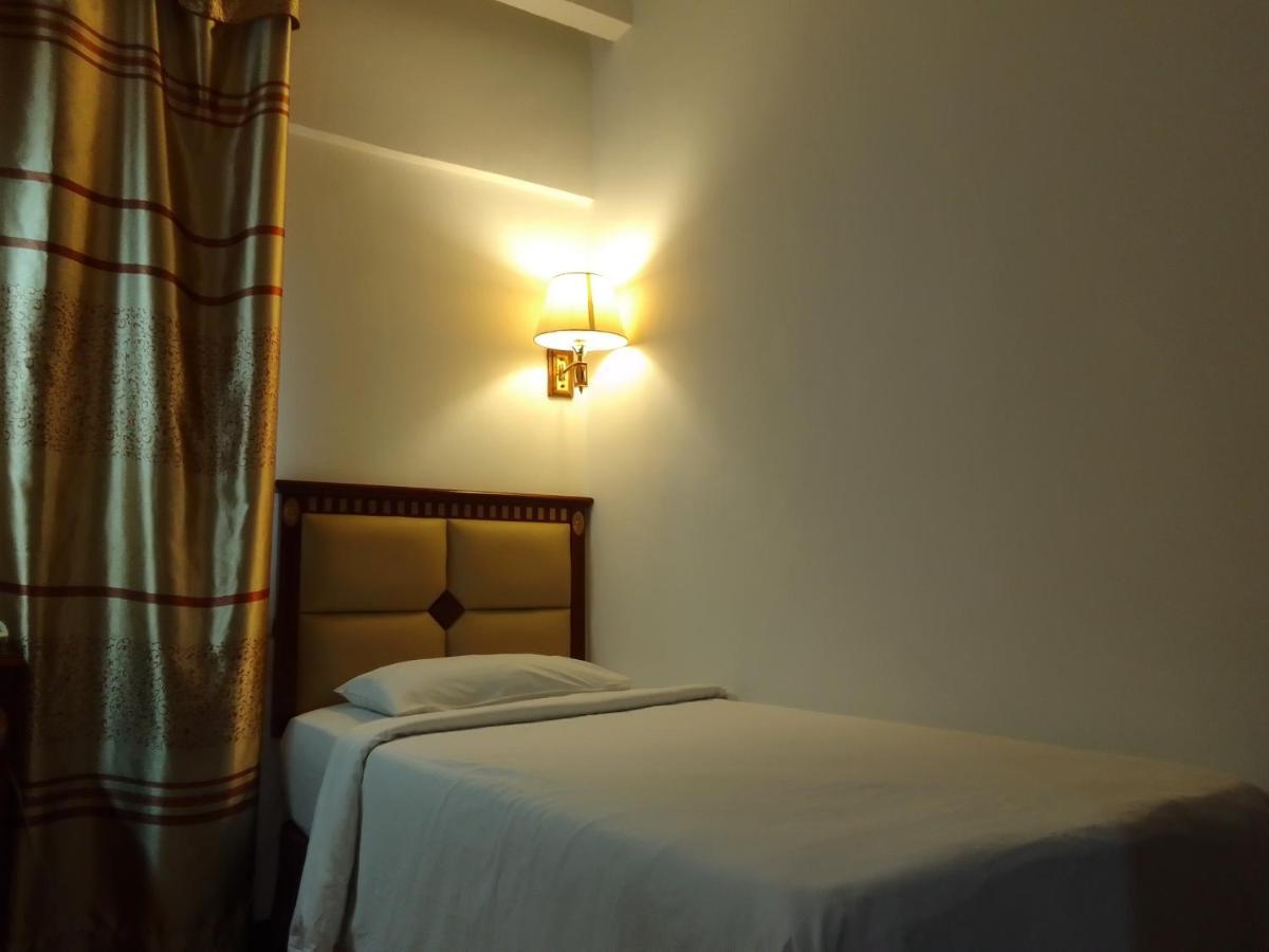 Super Oyo 90464 Borneo Suites Hotel Kota Kinabalu Buitenkant foto