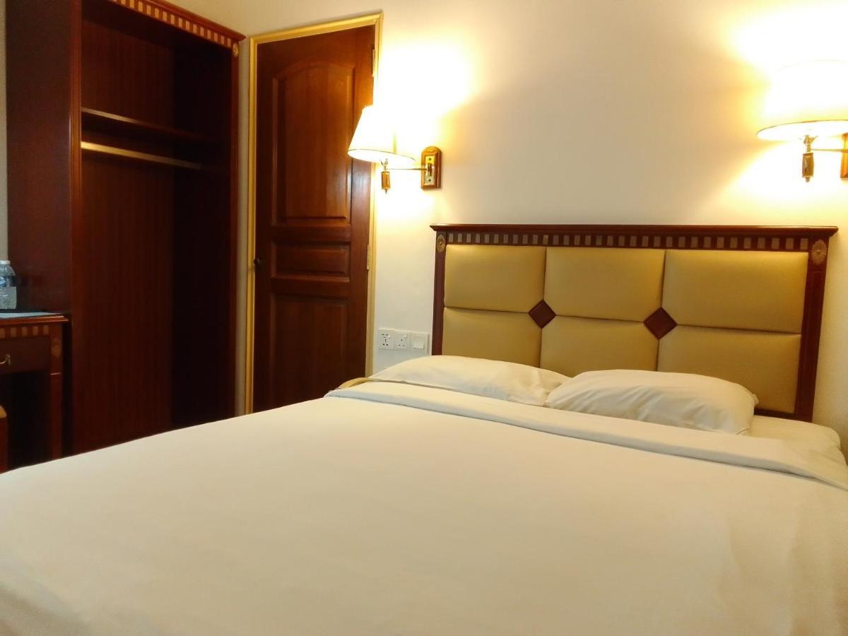 Super Oyo 90464 Borneo Suites Hotel Kota Kinabalu Buitenkant foto
