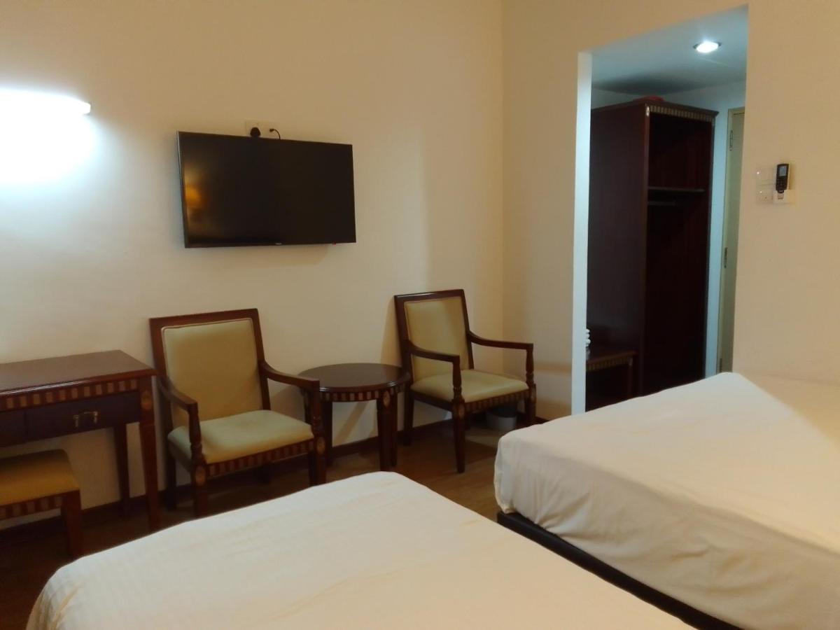 Super Oyo 90464 Borneo Suites Hotel Kota Kinabalu Buitenkant foto