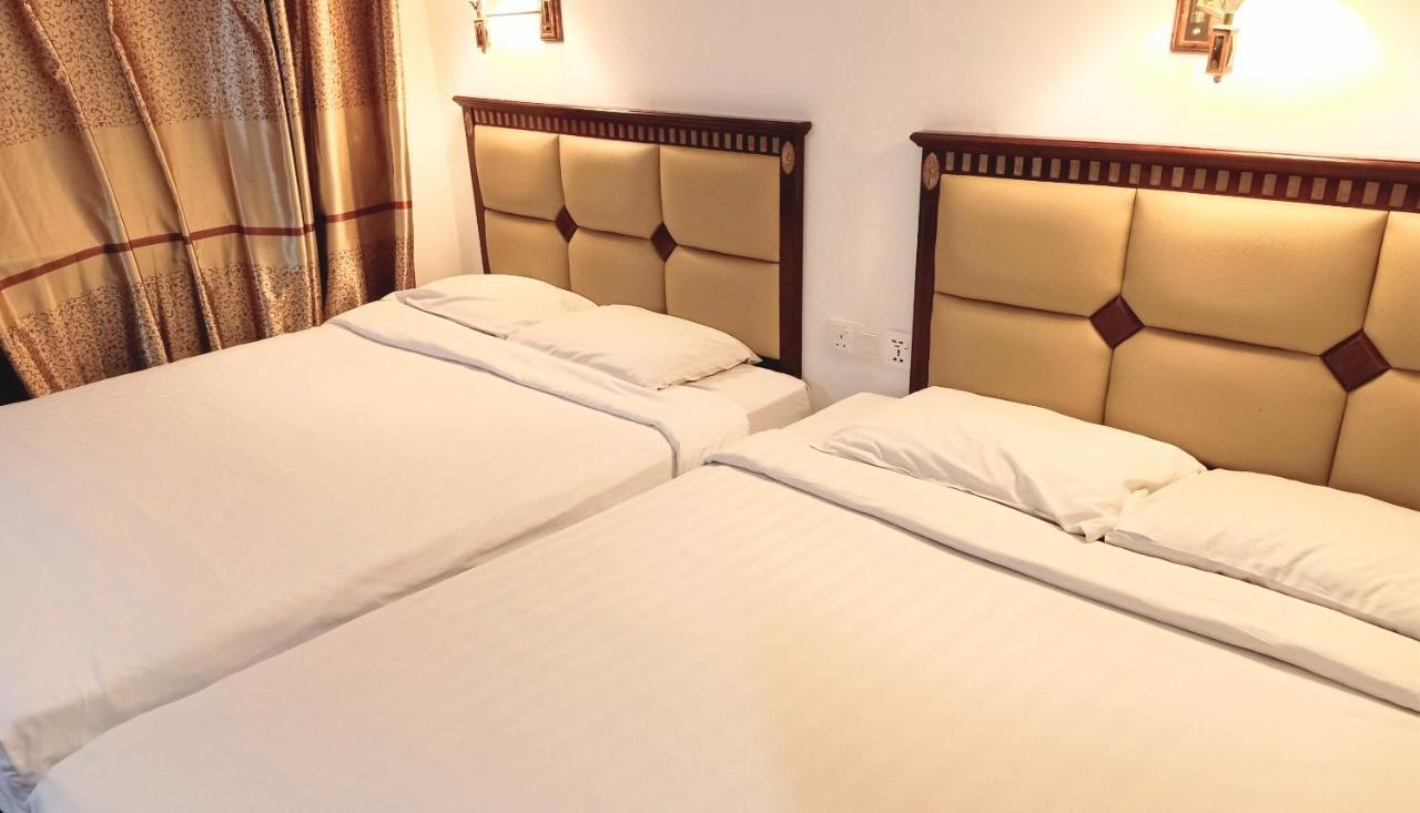 Super Oyo 90464 Borneo Suites Hotel Kota Kinabalu Buitenkant foto