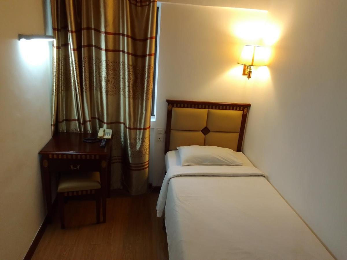 Super Oyo 90464 Borneo Suites Hotel Kota Kinabalu Buitenkant foto