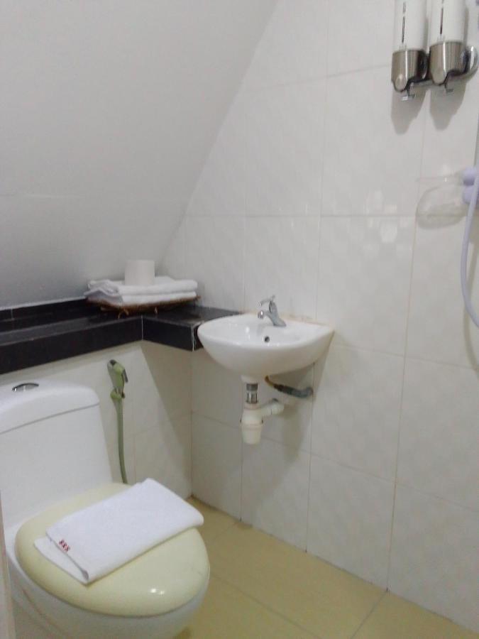 Super Oyo 90464 Borneo Suites Hotel Kota Kinabalu Buitenkant foto