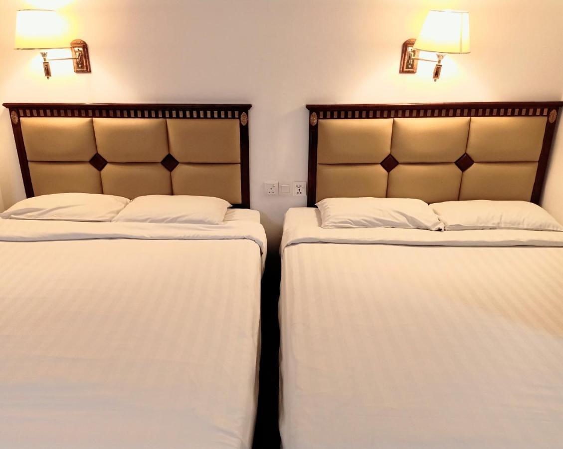 Super Oyo 90464 Borneo Suites Hotel Kota Kinabalu Buitenkant foto