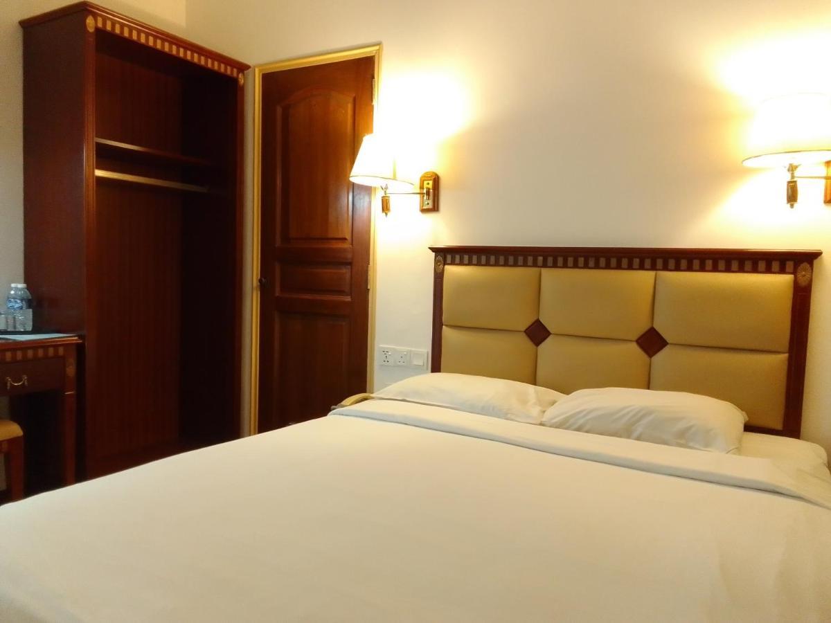 Super Oyo 90464 Borneo Suites Hotel Kota Kinabalu Buitenkant foto