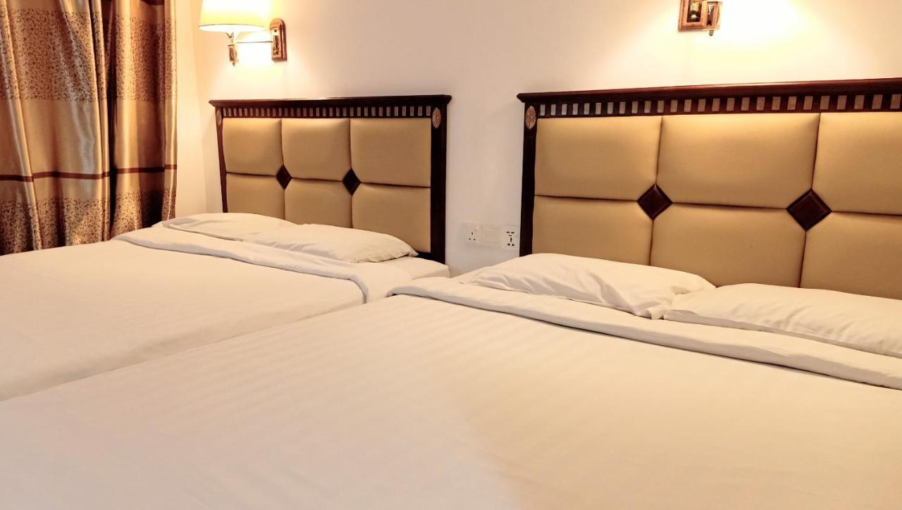 Super Oyo 90464 Borneo Suites Hotel Kota Kinabalu Buitenkant foto