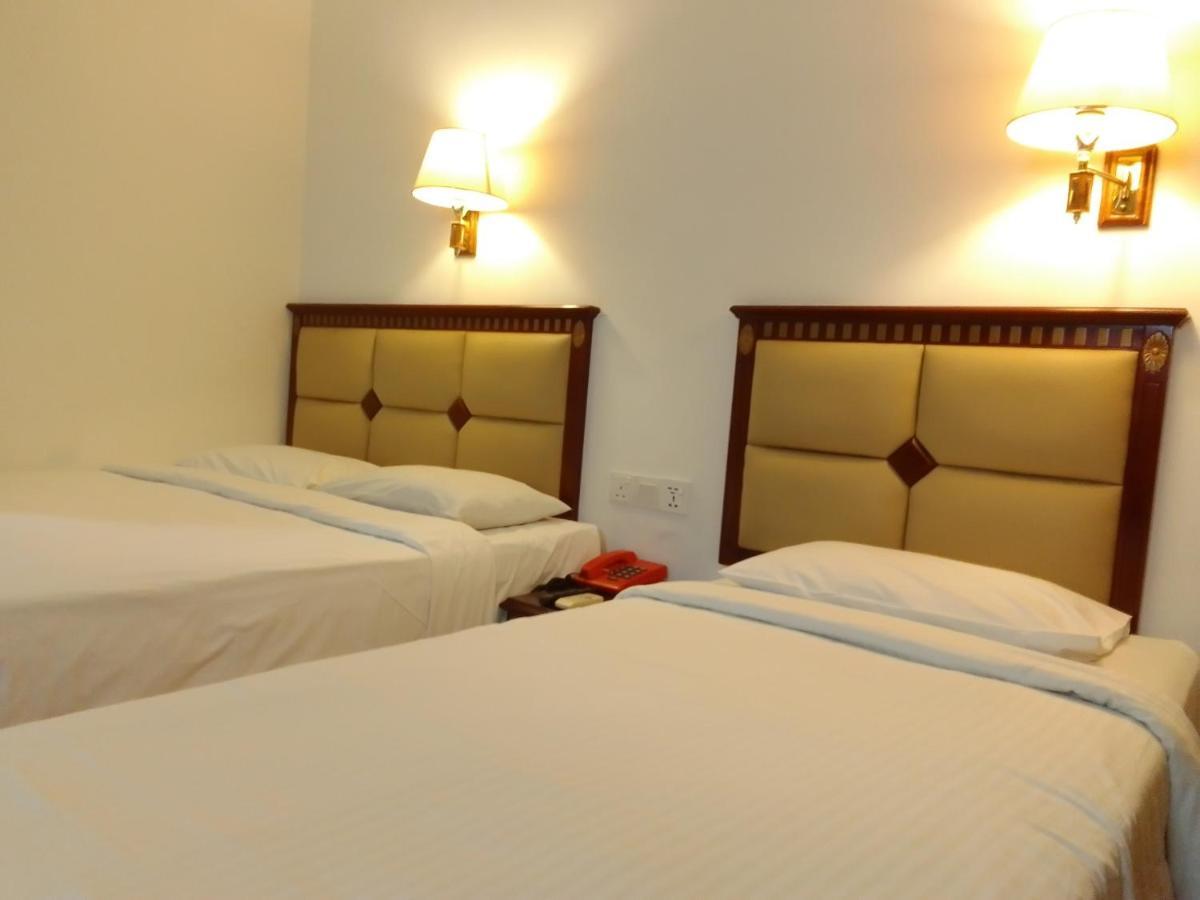 Super Oyo 90464 Borneo Suites Hotel Kota Kinabalu Buitenkant foto