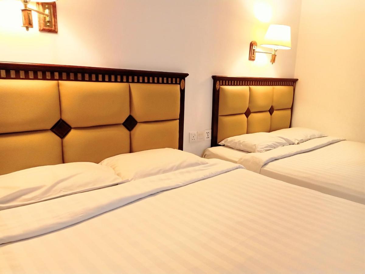 Super Oyo 90464 Borneo Suites Hotel Kota Kinabalu Buitenkant foto